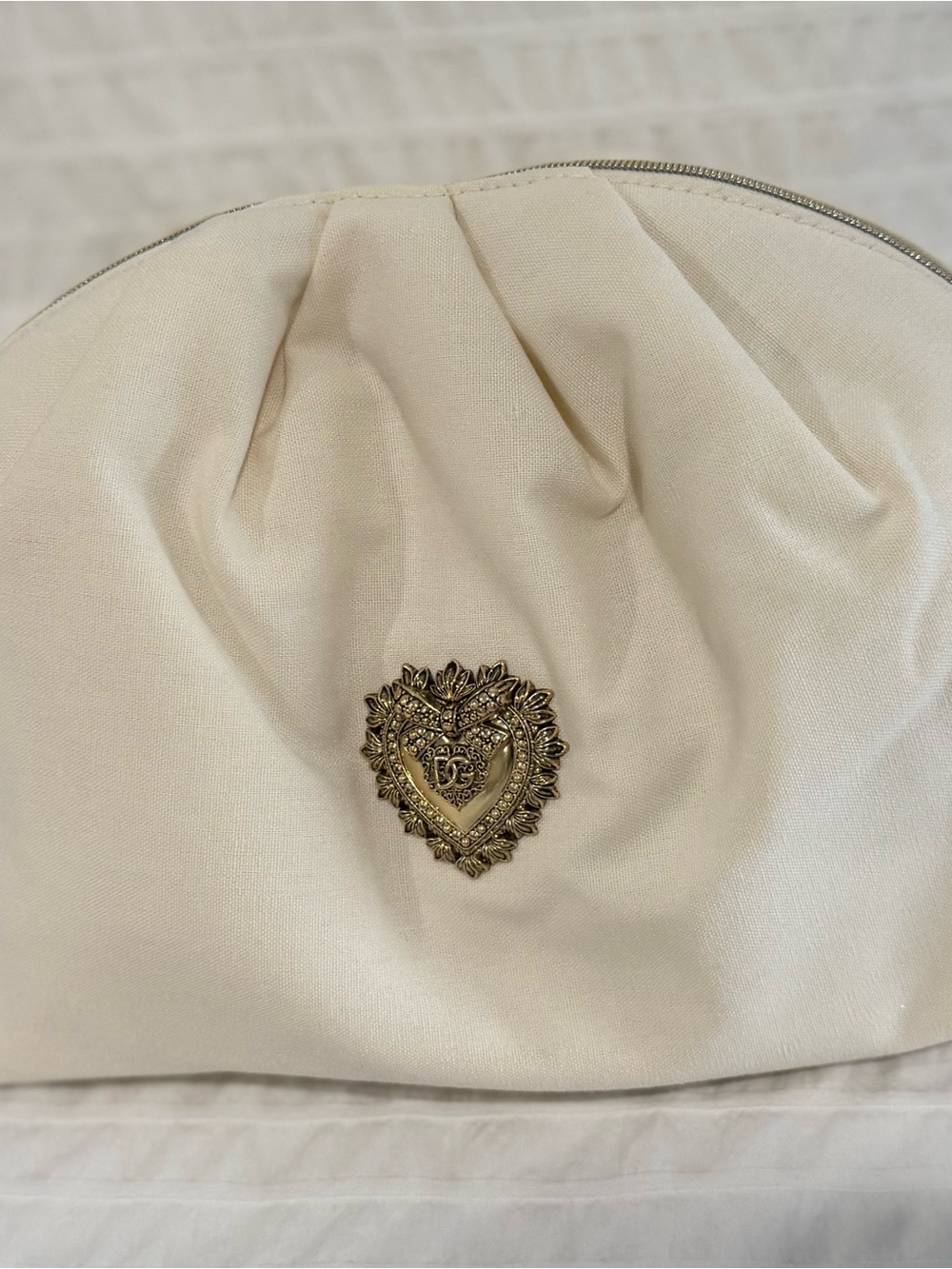 Dolce & Gabbana Cream Cosmetic Pouch with Gold Heart Emblem